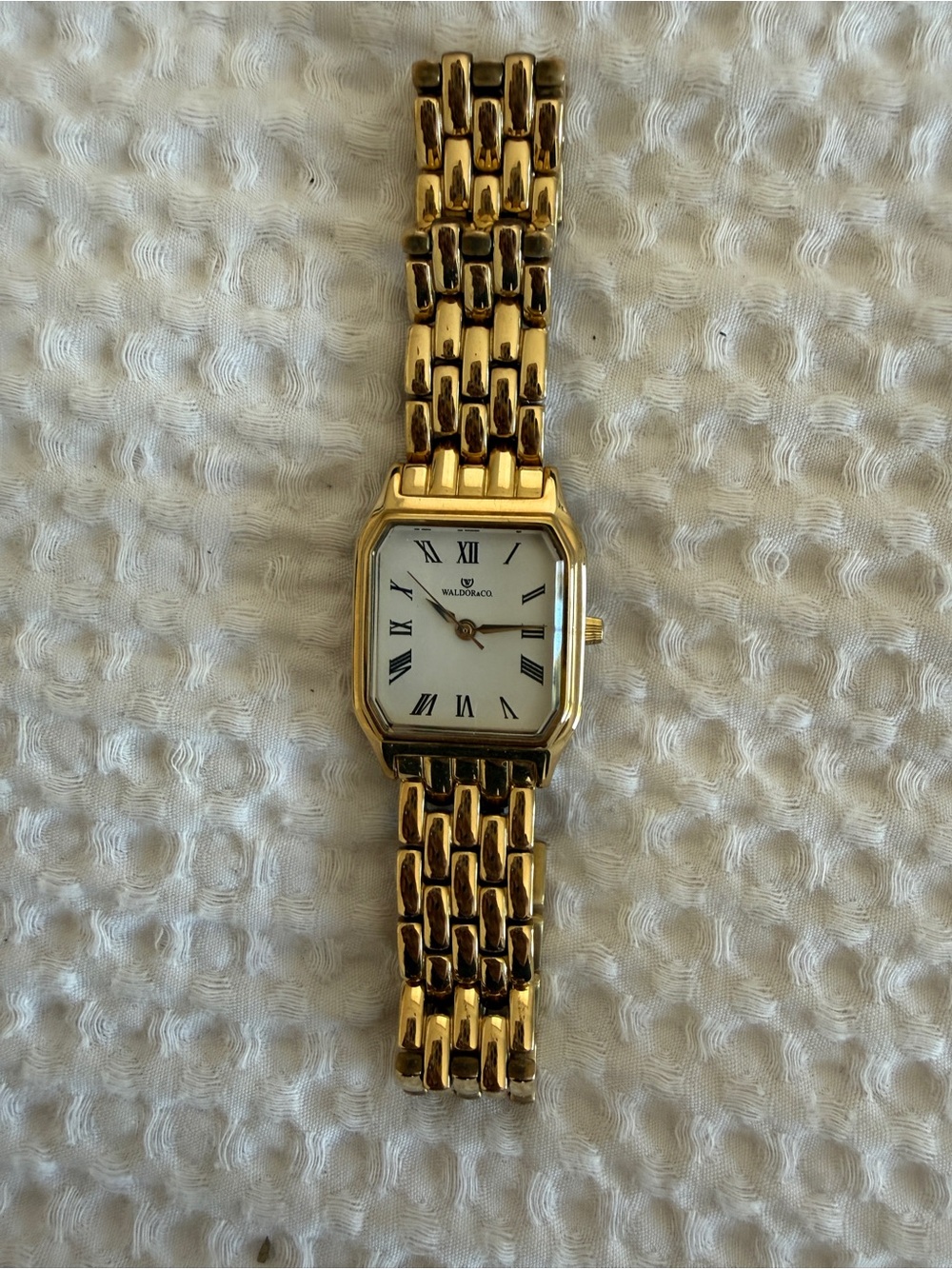 Waldor & Co. Gold Tone Roman Numeral Bracelet Watch
